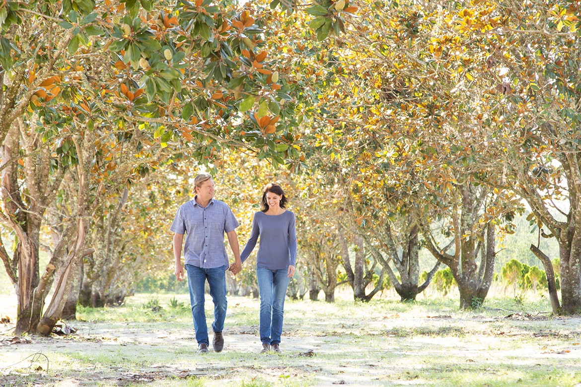 Matt & Julie Walking the New Magnolia Tree Grove