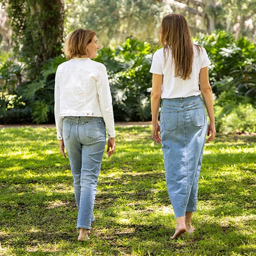 Two people walking outdoors