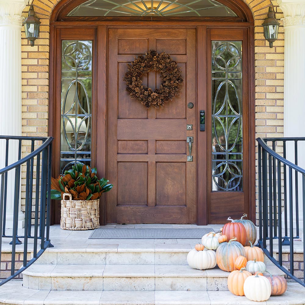Pinecone wreath on door for fall decor